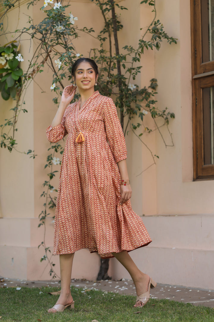 Orange Pure Cotton Tribal Print Fancy Tussle Work Flared Designer Dress