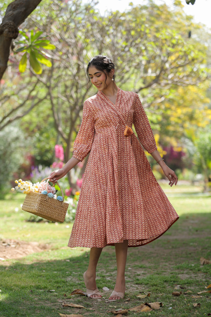 Orange Pure Cotton Tribal Print Fancy Tussle Work Flared Designer Dress