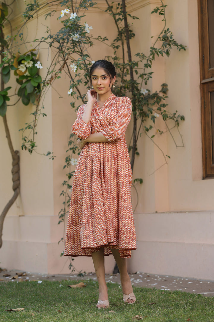 Orange Pure Cotton Tribal Print Fancy Tussle Work Flared Designer Dress