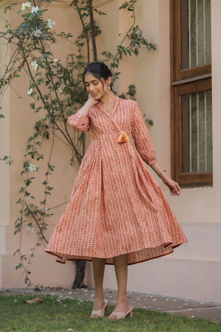 Orange Pure Cotton Tribal Print Fancy Tussle Work Flared Designer Dress