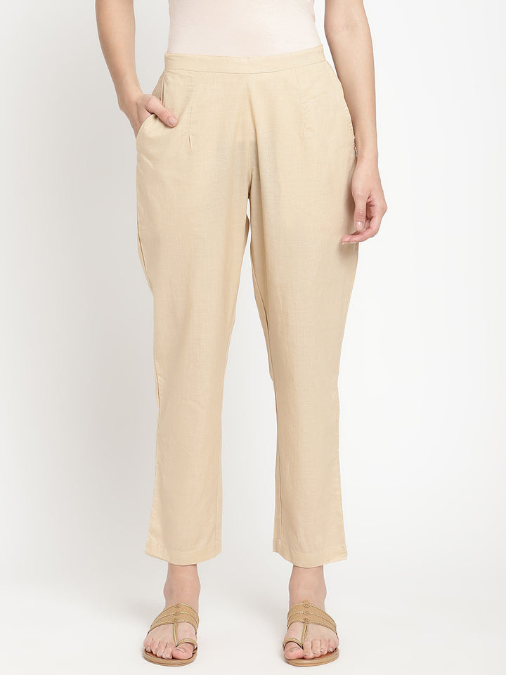 Beige cotton straight pant crafted by a homegrown brand named Savi.