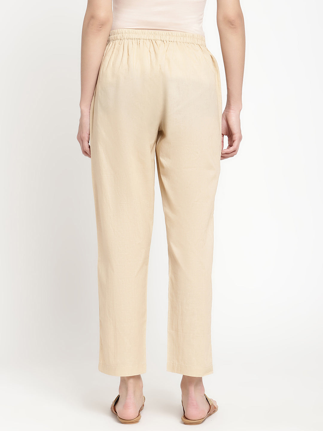 Beige cotton straight pant crafted by a homegrown brand named Savi.