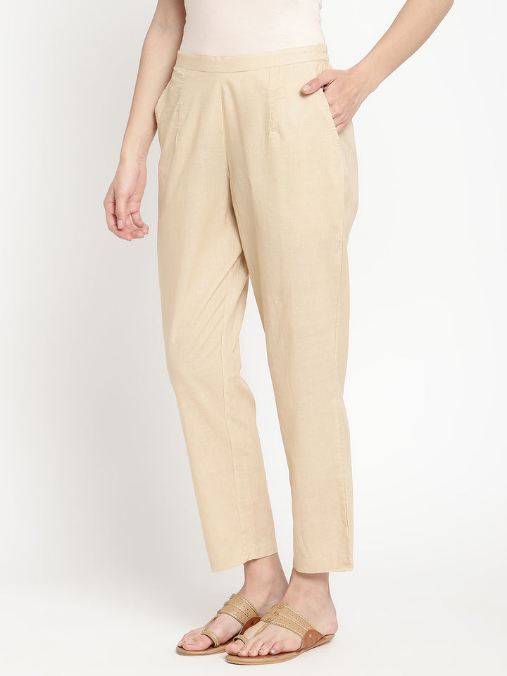 Beige cotton straight pant crafted by a homegrown brand named Savi.