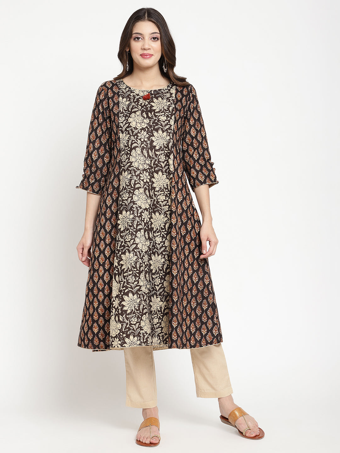 Woman posing in Beige and Black Cotton Printed A Line Kurta Dress
