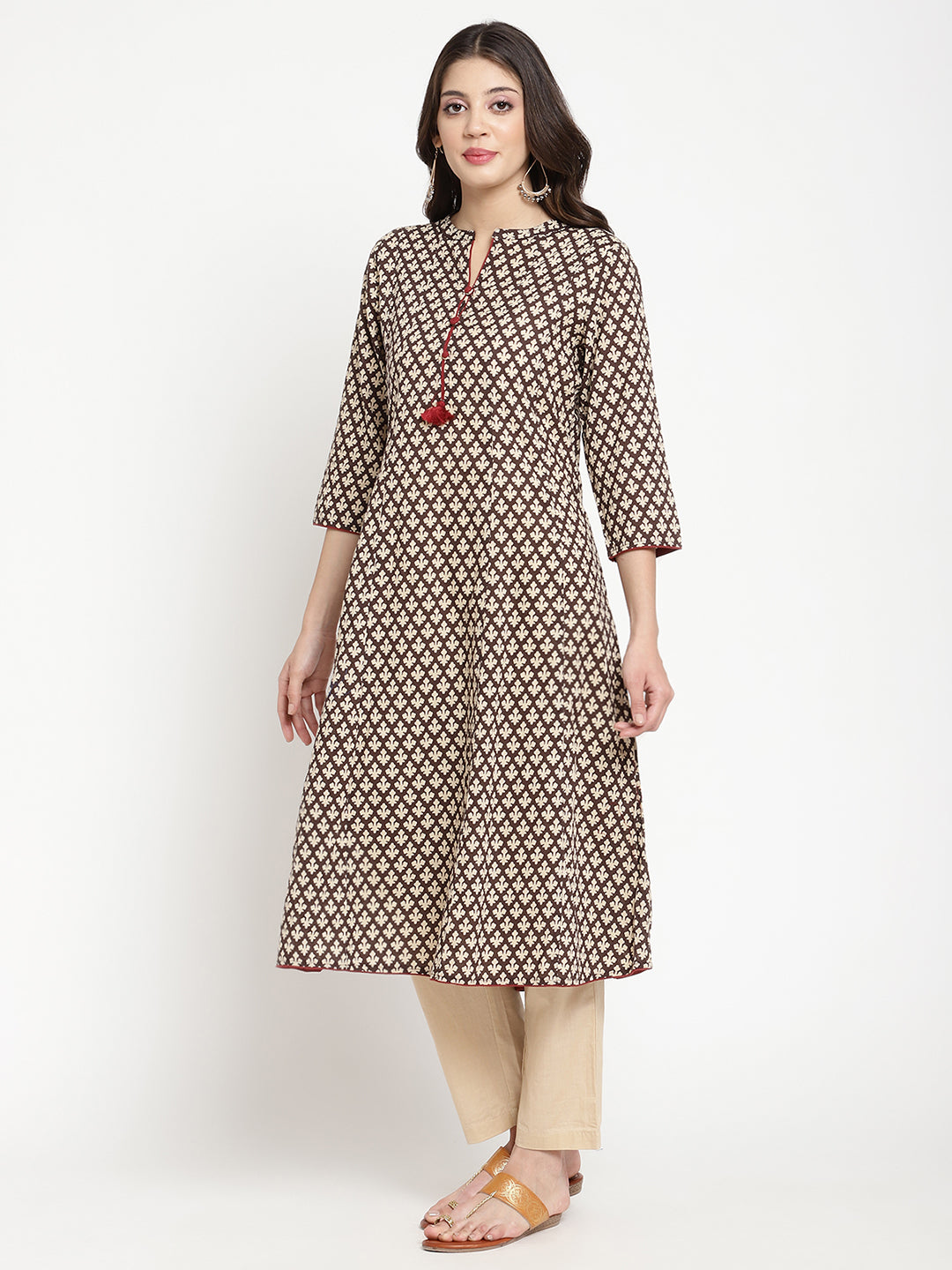 Multicolor Cotton Printed Flared Kurta showcased in a full length picture by Savi model.