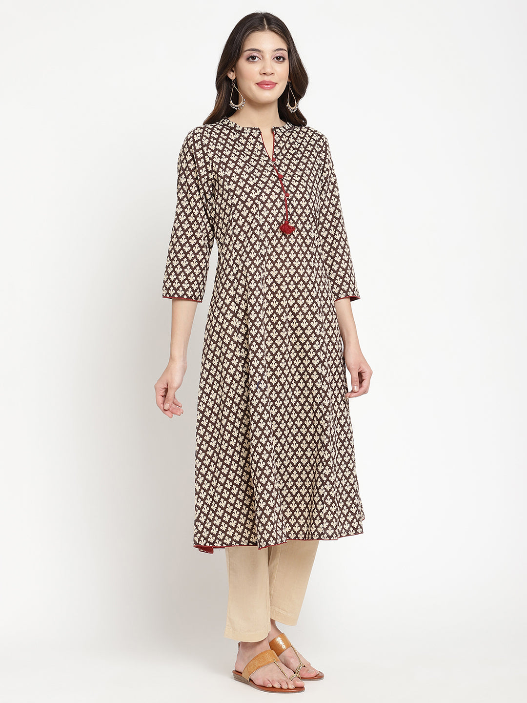 Multicolor Cotton Printed Flared Kurta showcased in a full length picture by Savi model.