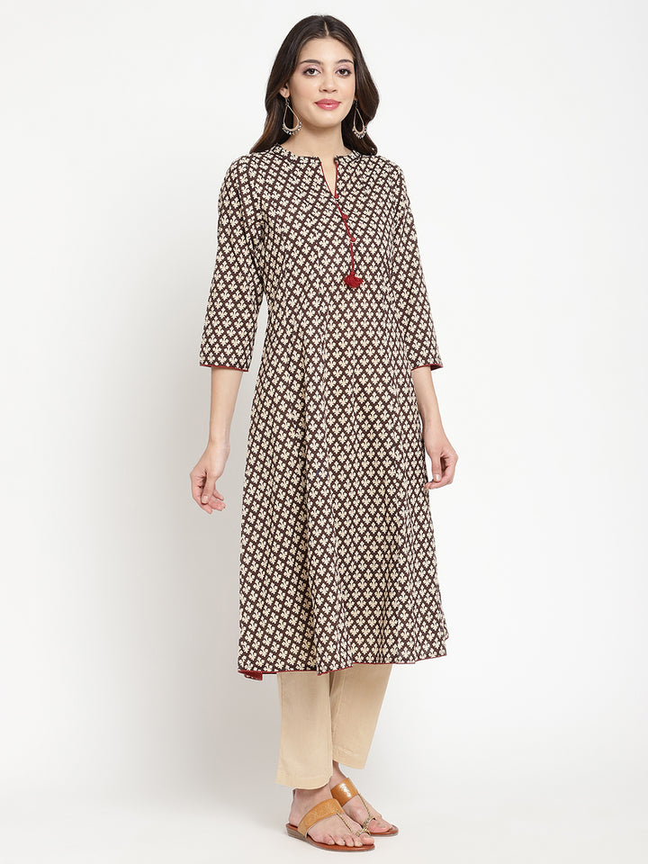 Multicolor Cotton Printed Flared Kurta showcased in a full length picture by Savi model.