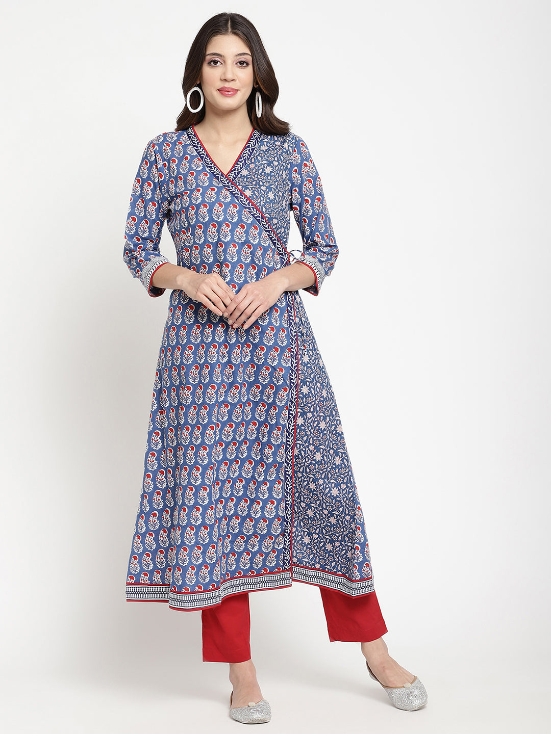 Savi model posing in a blue cotton Angrakha Anarkali Kurta.