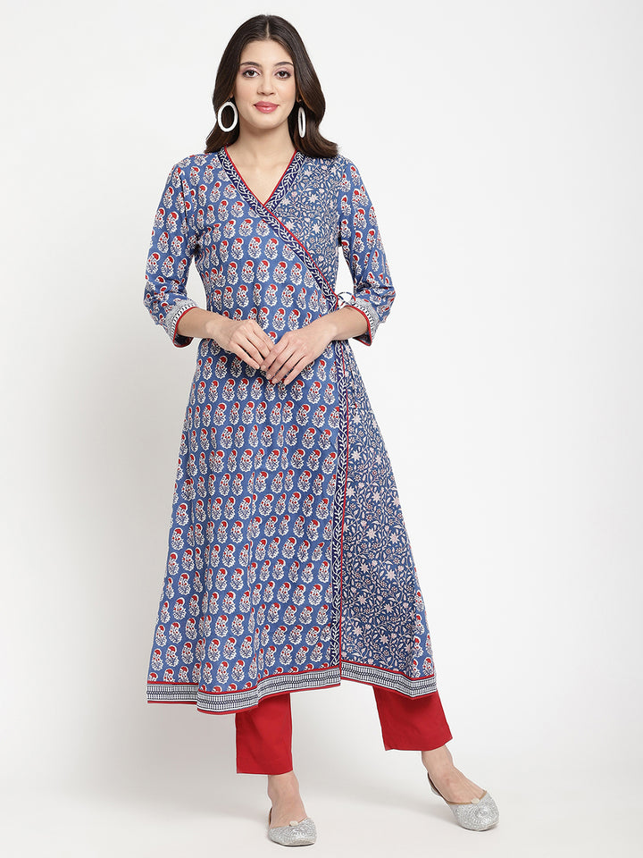Savi model posing in a blue cotton Angrakha Anarkali Kurta.