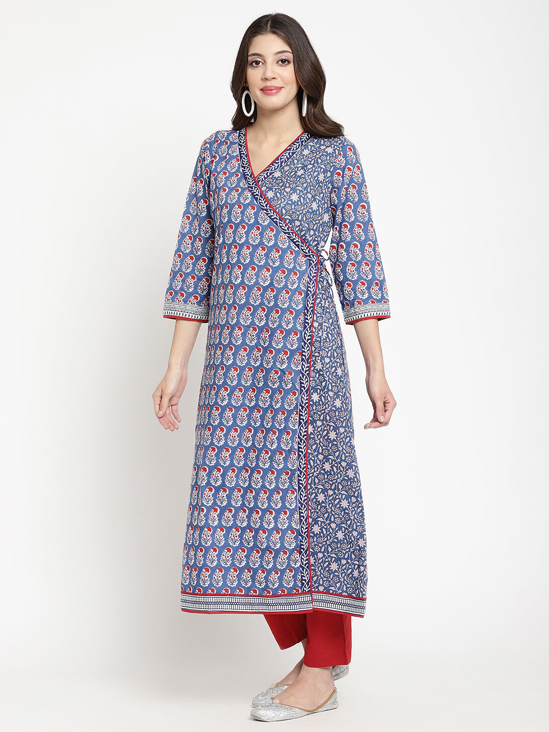 Savi model posing in a blue cotton Angrakha Anarkali Kurta.