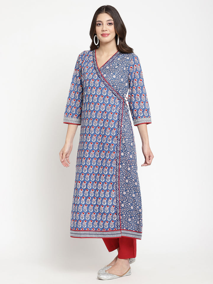 Savi model posing in a blue cotton Angrakha Anarkali Kurta.
