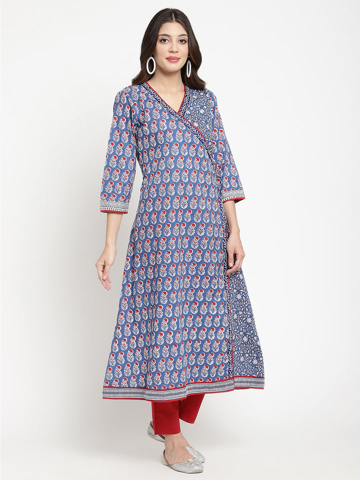 Savi model posing in a blue cotton Angrakha Anarkali Kurta.