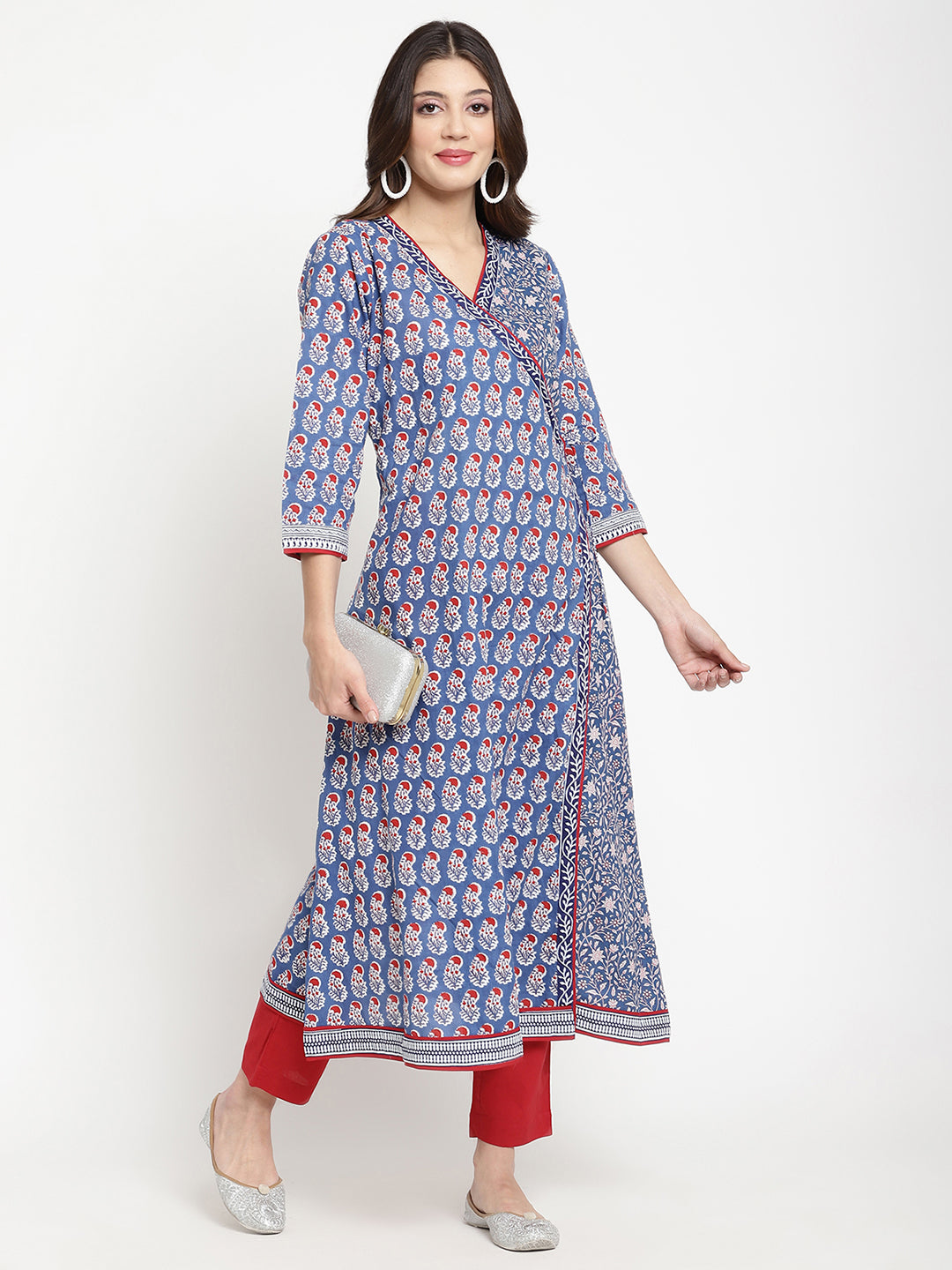 Savi model posing in a blue cotton Angrakha Anarkali Kurta.