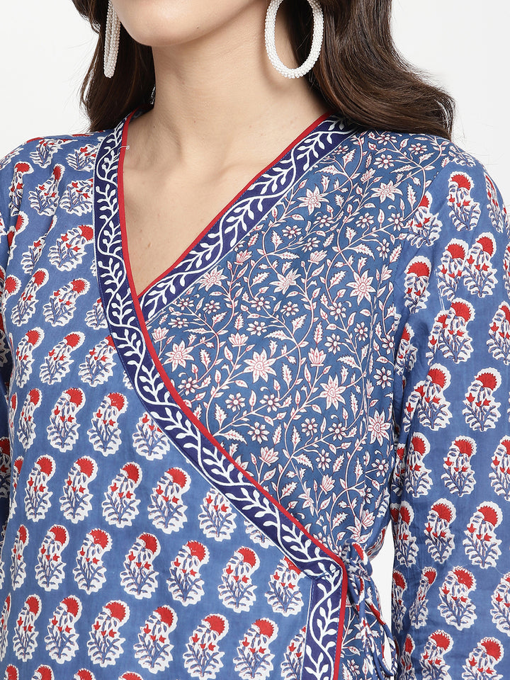 Savi model posing in a blue cotton Angrakha Anarkali Kurta.