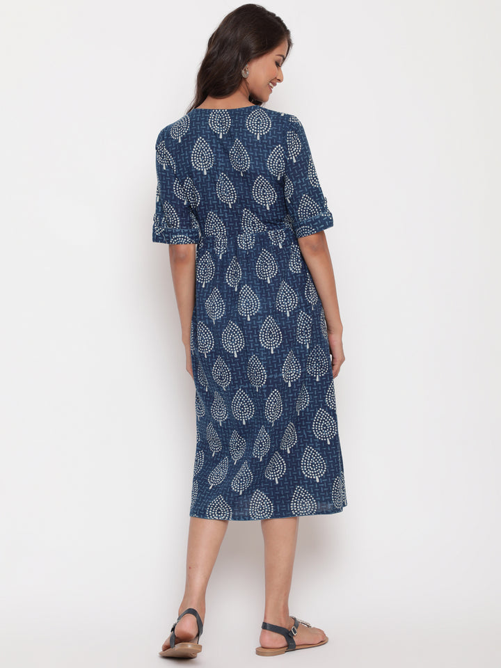 Woman posing in Savi's Cotton Indigo Ethnic Motif printed Button Closure Dress