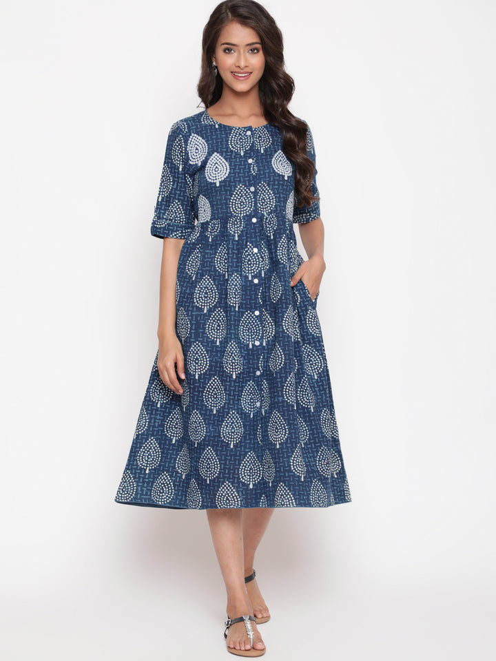 Woman posing in Savi's Cotton Indigo Ethnic Motif printed Button Closure Dress