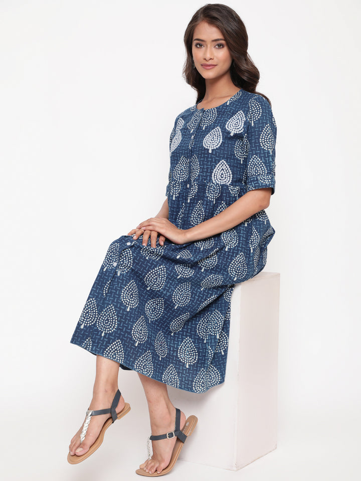 Woman posing in Savi's Cotton Indigo Ethnic Motif printed Button Closure Dress