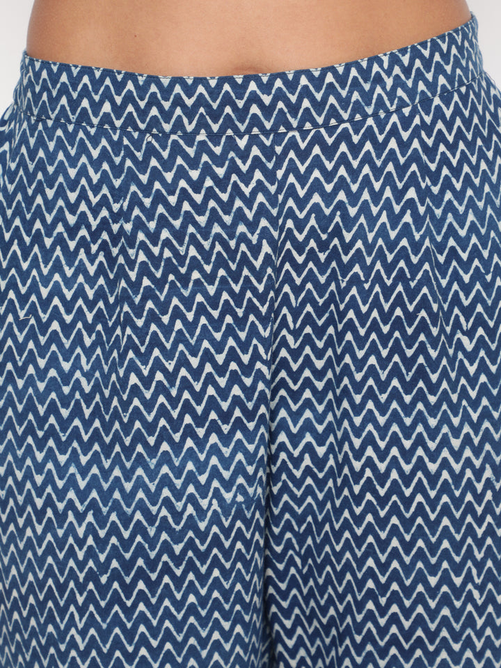 Woman posing in Savi's Cotton Indigo Printed casual Kurta Pant Set