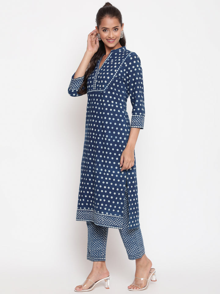 Woman posing in Savi's Cotton Indigo Printed casual Kurta Pant Set