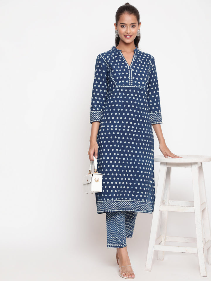 Woman posing in Savi's Cotton Indigo Printed casual Kurta Pant Set