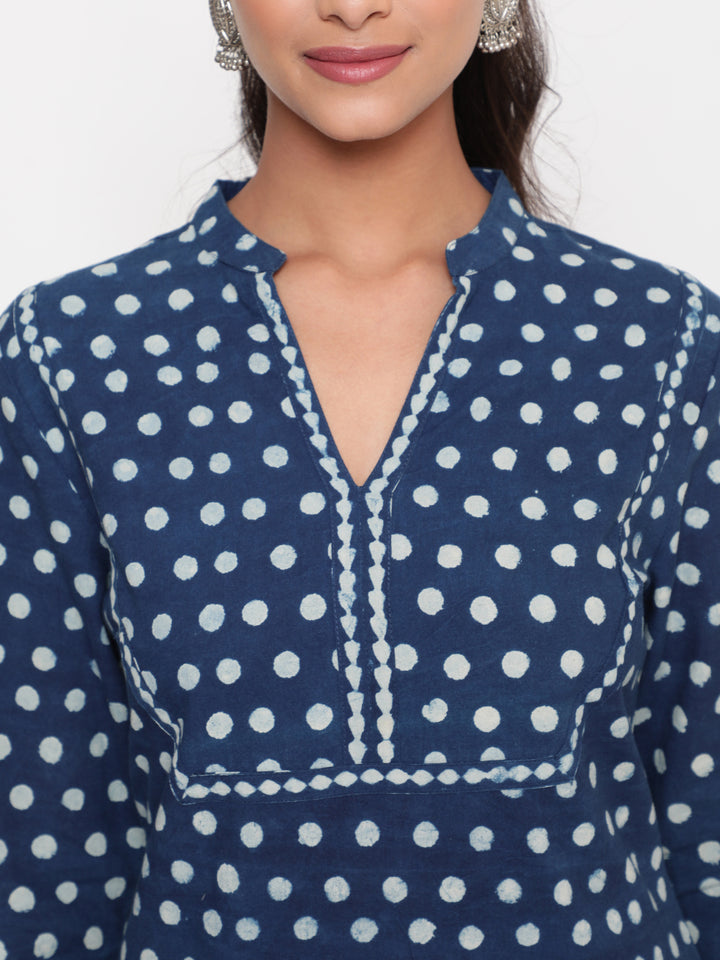 Woman posing in Savi's Cotton Indigo Printed casual Kurta Pant Set