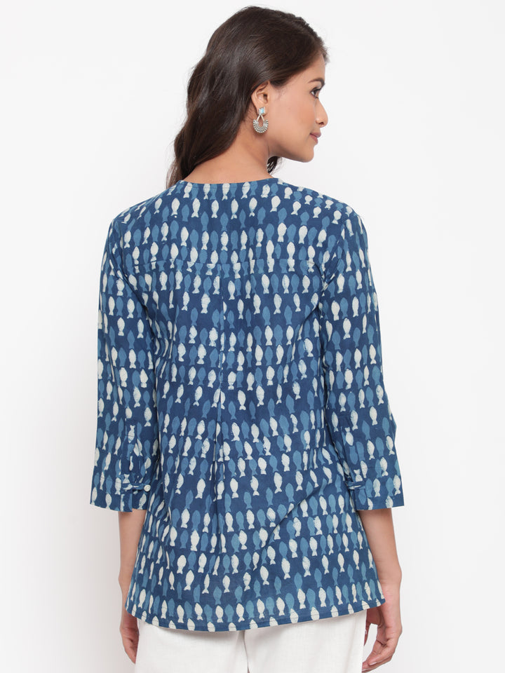 Woman posing in Savi's Cotton Indigo printed Hidden placket High-Low Tunic