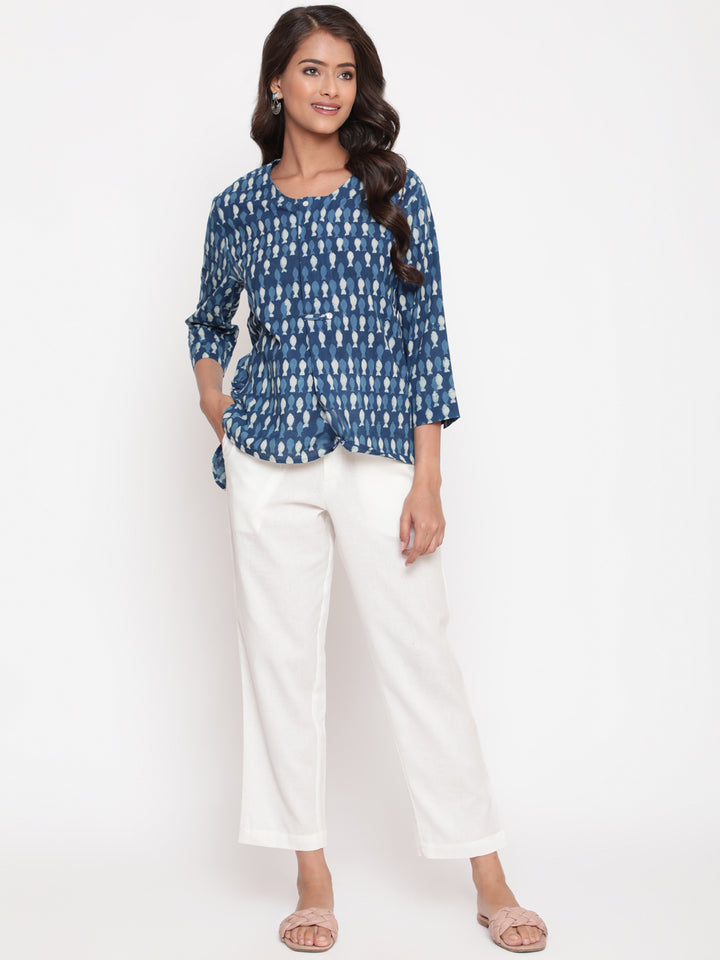 Woman posing in Savi's Cotton Indigo printed Hidden placket High-Low Tunic