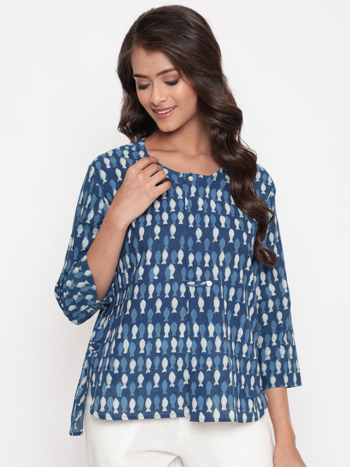 Woman posing in Savi's Cotton Indigo printed Hidden placket High-Low Tunic