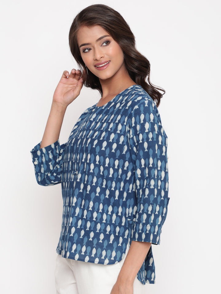 Woman posing in Savi's Cotton Indigo printed Hidden placket High-Low Tunic