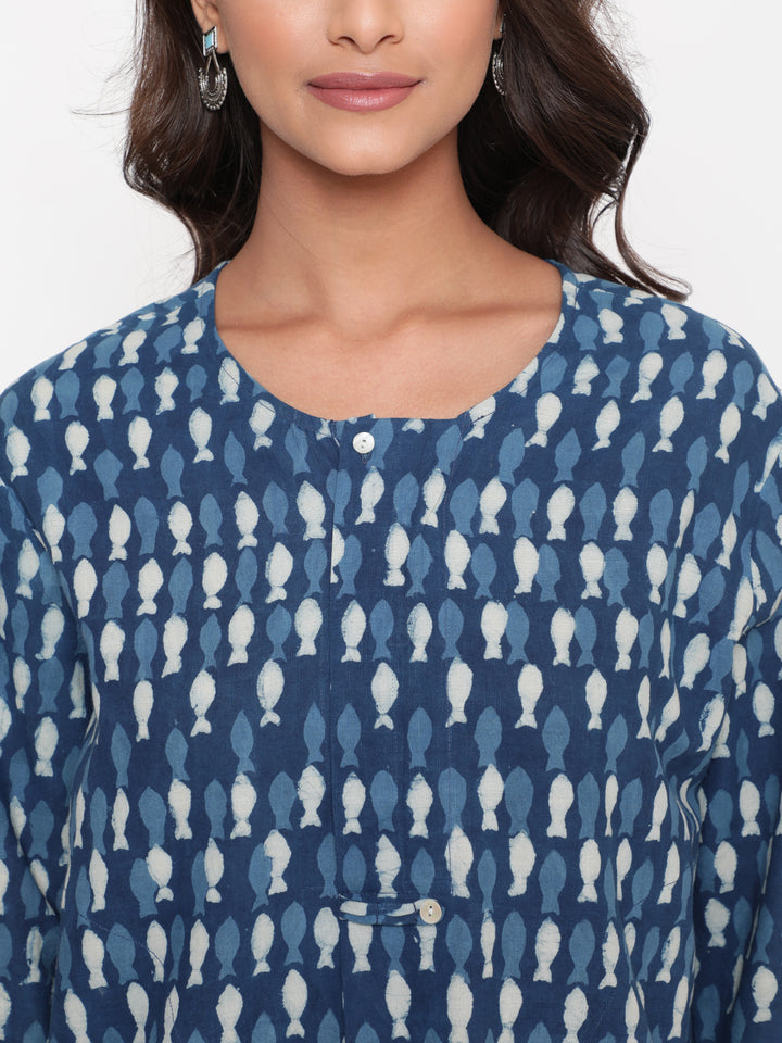 Woman posing in Savi's Cotton Indigo printed Hidden placket High-Low Tunic