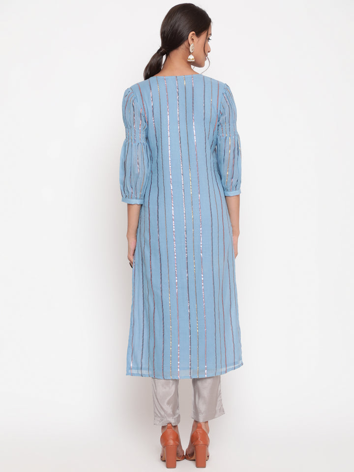 Woman posing in Powder Blue Cotton Lurex Straight Kurta