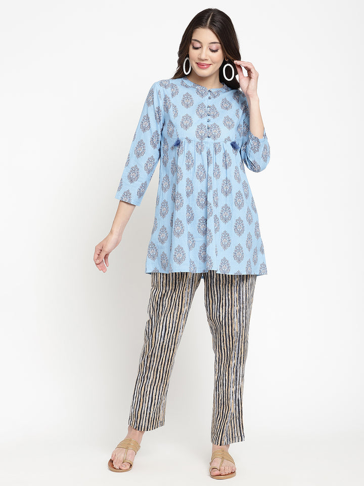 One of the Savi Women wearing dark grey pants crafted from cotton fabric.
