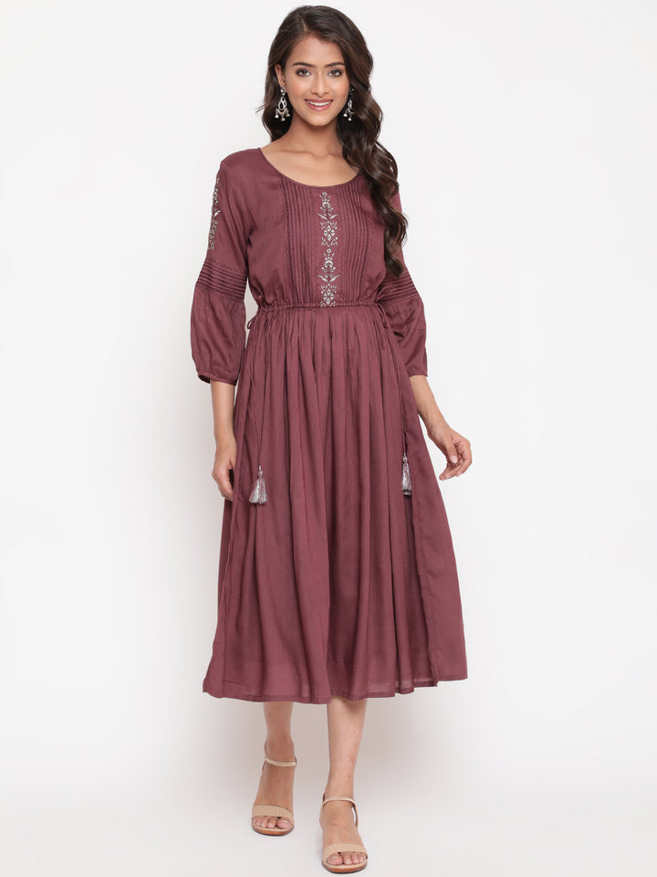 Woman posing in Wine Embroidered Tie Up Flared Dress