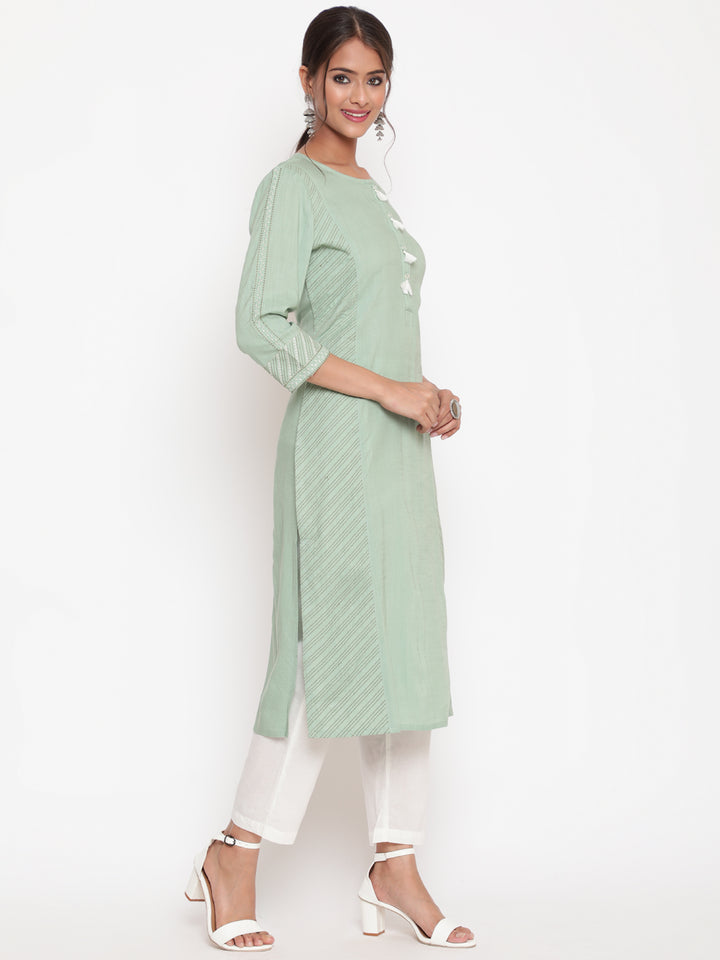 Savi Model posing in Embroidered Sage Green Straight Fit Kurta