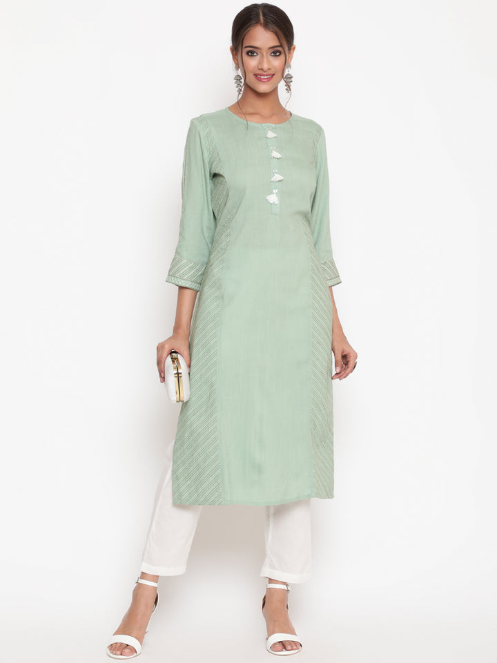 Savi Model posing in Embroidered Sage Green Straight Fit Kurta