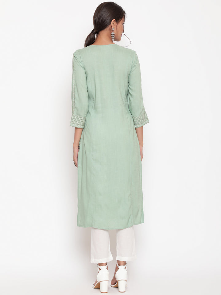 Savi Model posing in Embroidered Sage Green Straight Fit Kurta