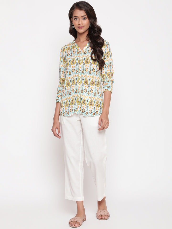 Woman posing in Savi's IKat  Multicolor rayon designer Shirt Top