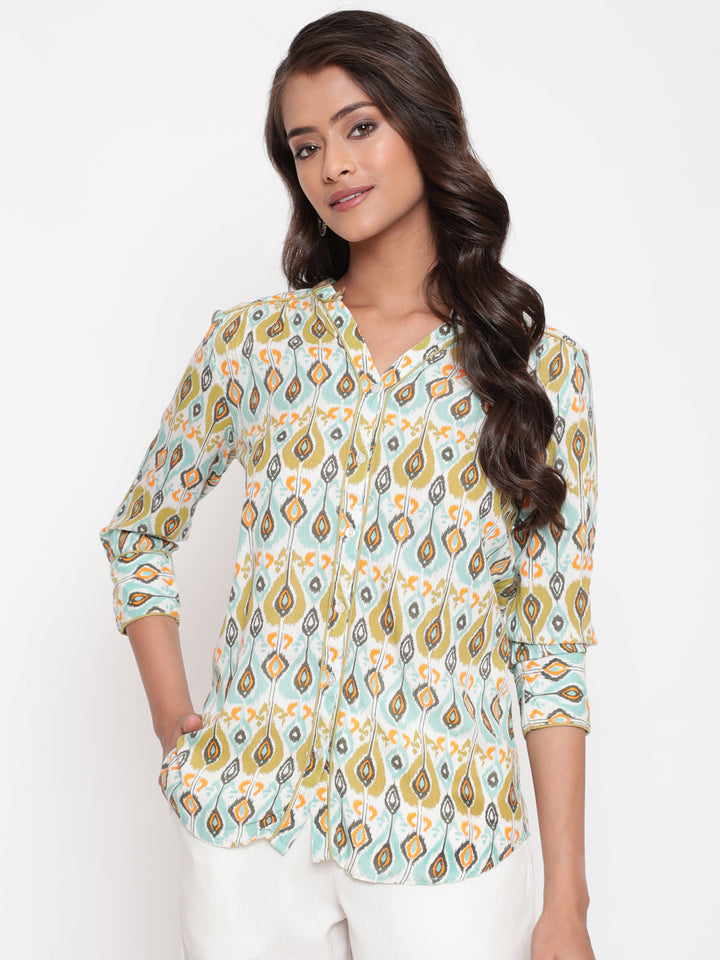 Woman posing in Savi's IKat  Multicolor rayon designer Shirt Top