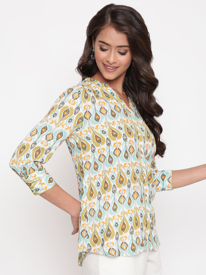Woman posing in Savi's IKat  Multicolor rayon designer Shirt Top