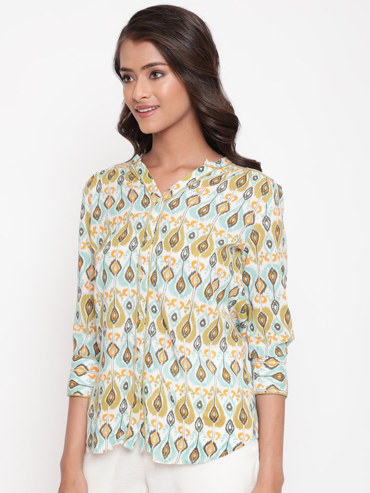 Woman posing in Savi's IKat  Multicolor rayon designer Shirt Top
