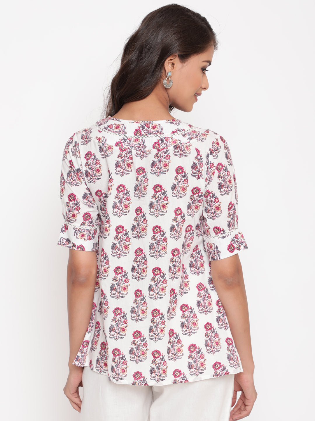 Woman posing in Savi's Cotton Printed White Pintuck Tunic