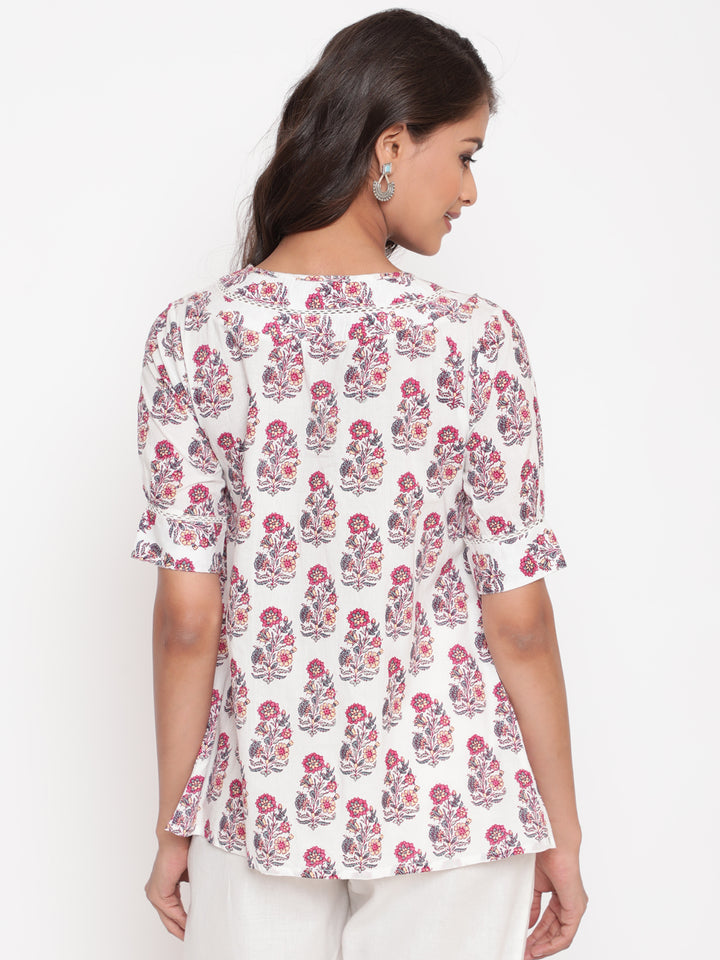 Woman posing in Savi's Cotton Printed White Pintuck Tunic