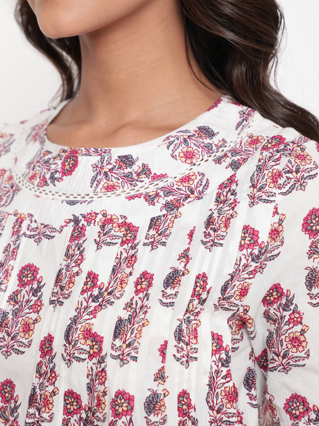 Woman posing in Savi's Cotton Printed White Pintuck Tunic