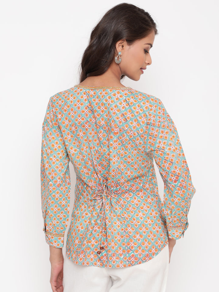 Woman posing in Savi's Cotton Printed Mint Pintuck Tunic