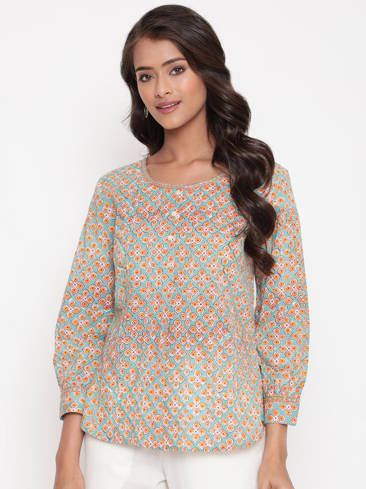 Woman posing in Savi's Cotton Printed Mint Pintuck Tunic