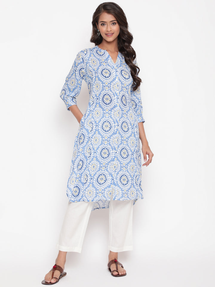 Woman posing in Savi's Blue Ikat Printed Mandarin Collar Kurta