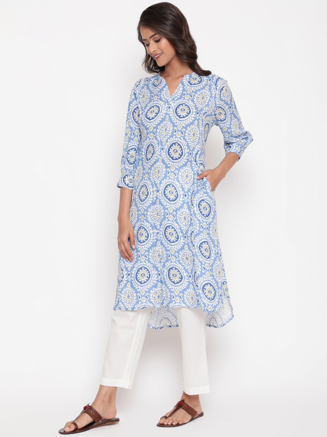 Woman posing in Savi's Blue Ikat Printed Mandarin Collar Kurta