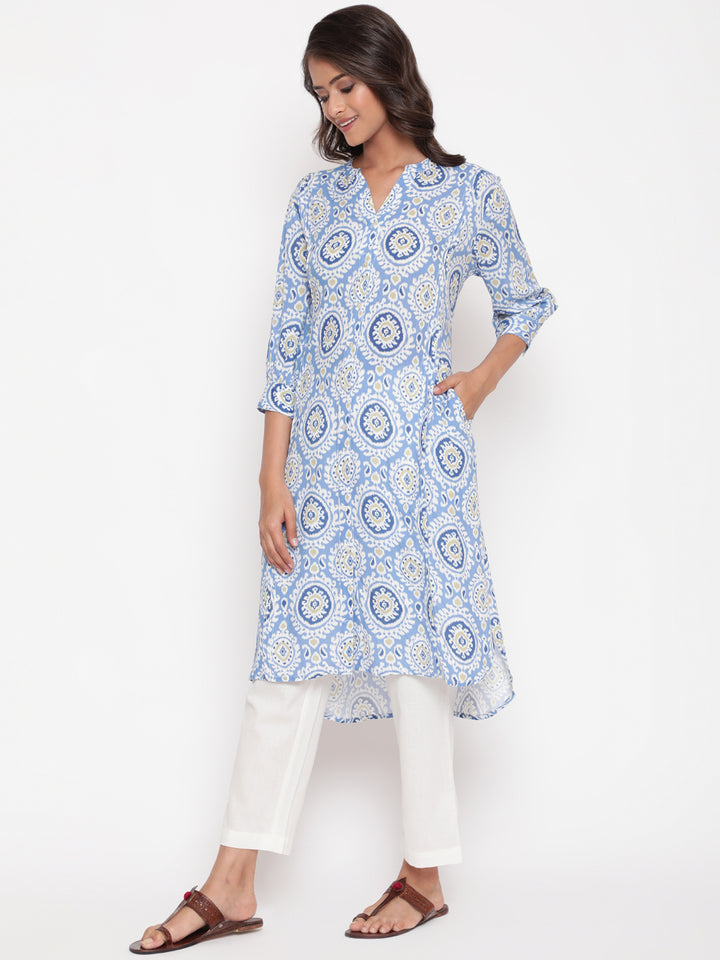 Woman posing in Savi's Blue Ikat Printed Mandarin Collar Kurta