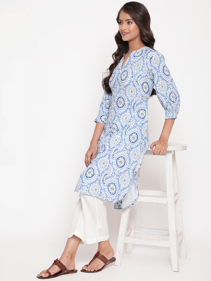Woman posing in Savi's Blue Ikat Printed Mandarin Collar Kurta
