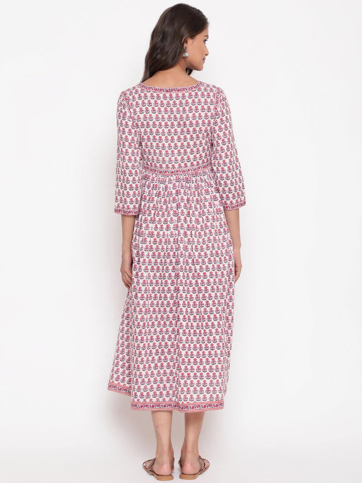 Woman posing in Savi's Cotton Block Printed White Flared Dress